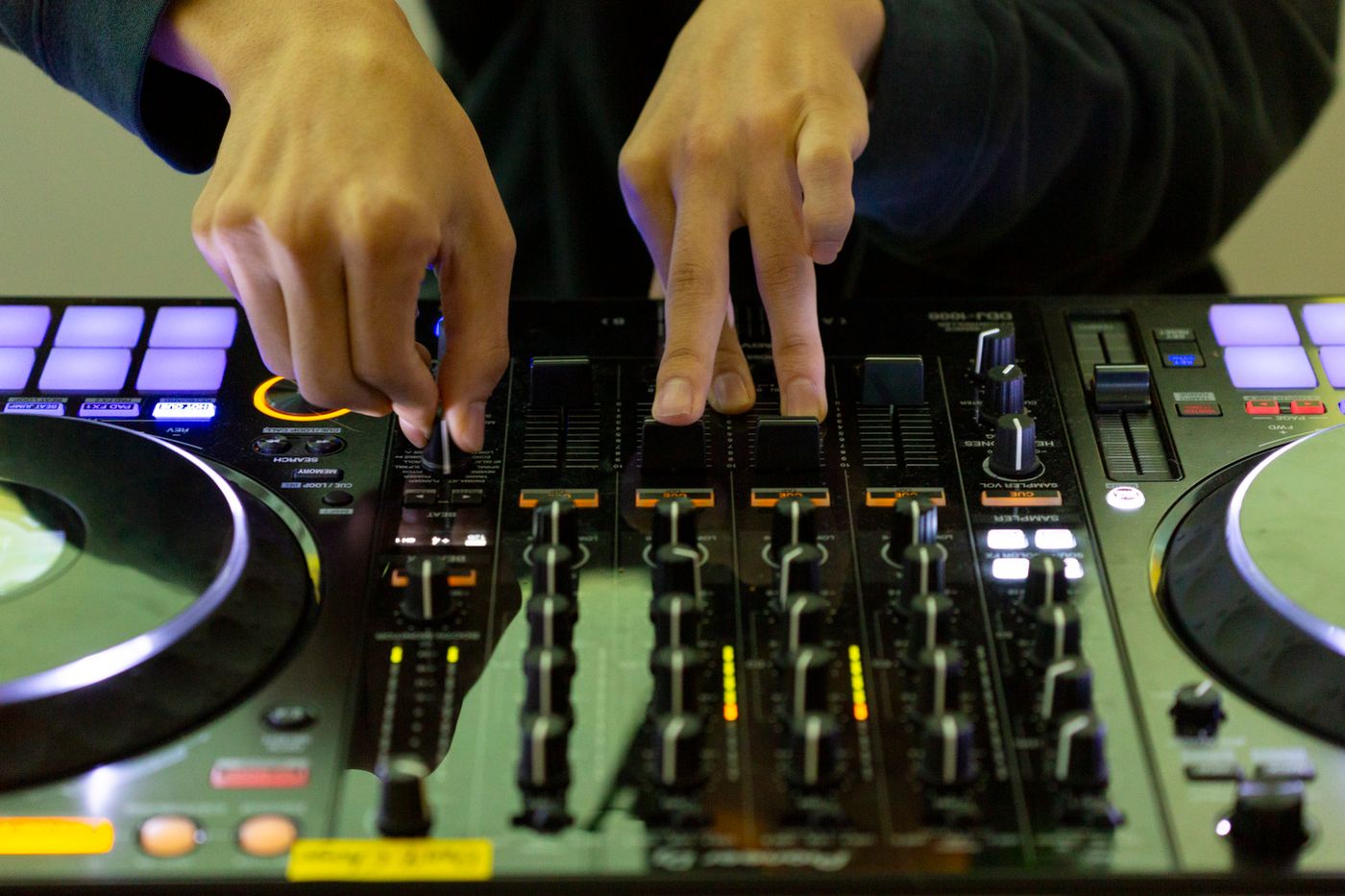 DJ controller with mixer in moody light